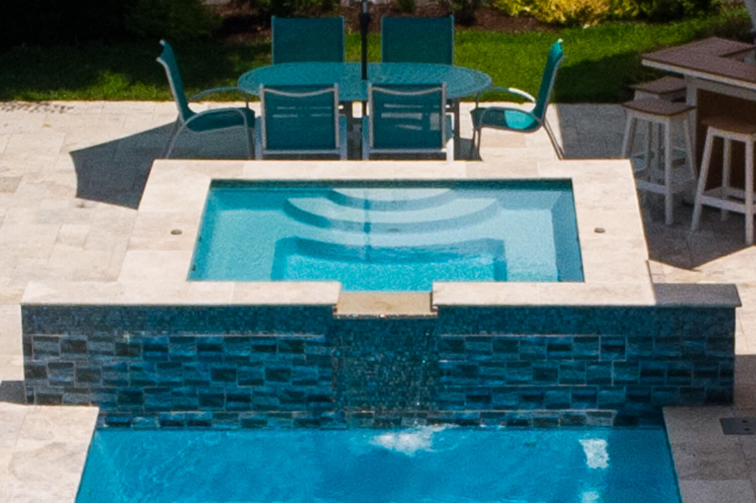 Square Spa with Spill Over Pool